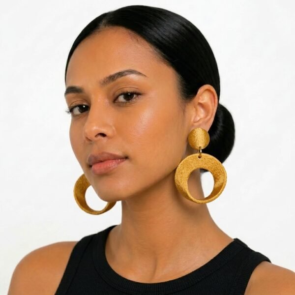Reference image for imperial earrings size and sculptural detail