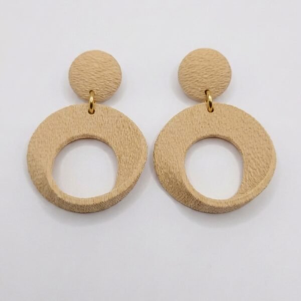 Side view of extra large sculptural imperial earrings design